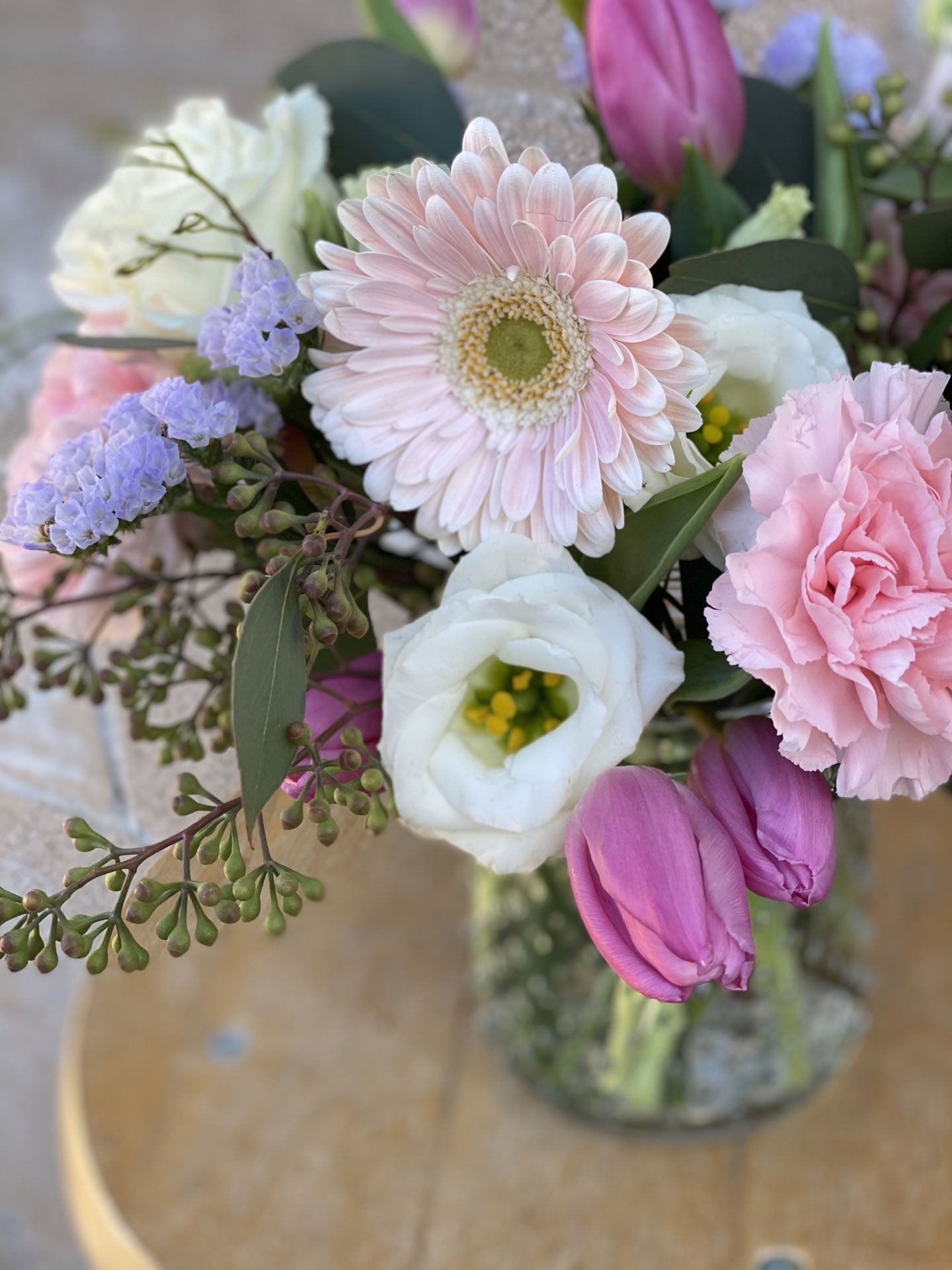Mixed Spring Arrangement in A Glass Jar