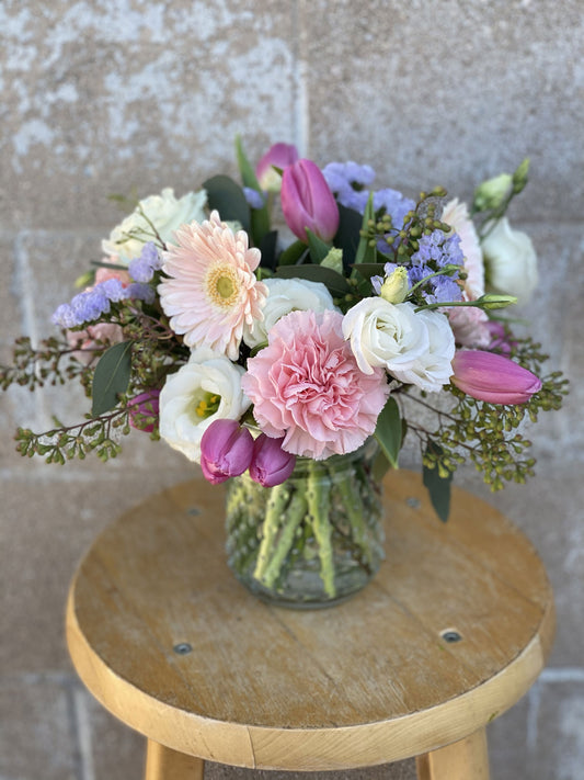 Mixed Spring Arrangement in A Glass Jar