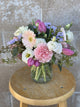 Mixed Spring Arrangement in A Glass Jar
